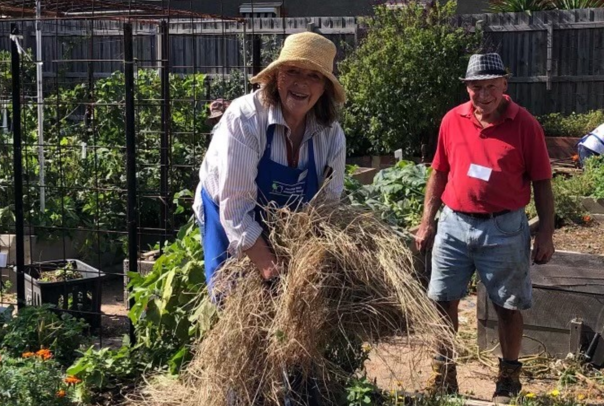 Lady and man gardening