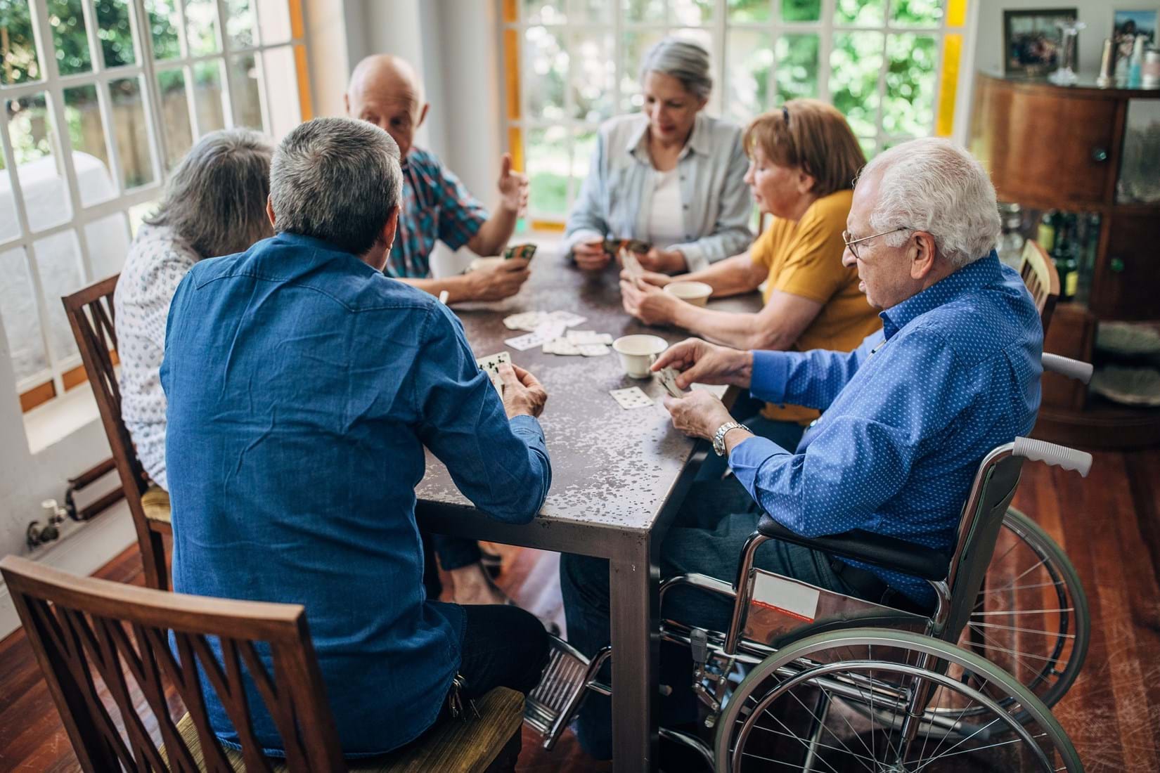 Group of people playing cards