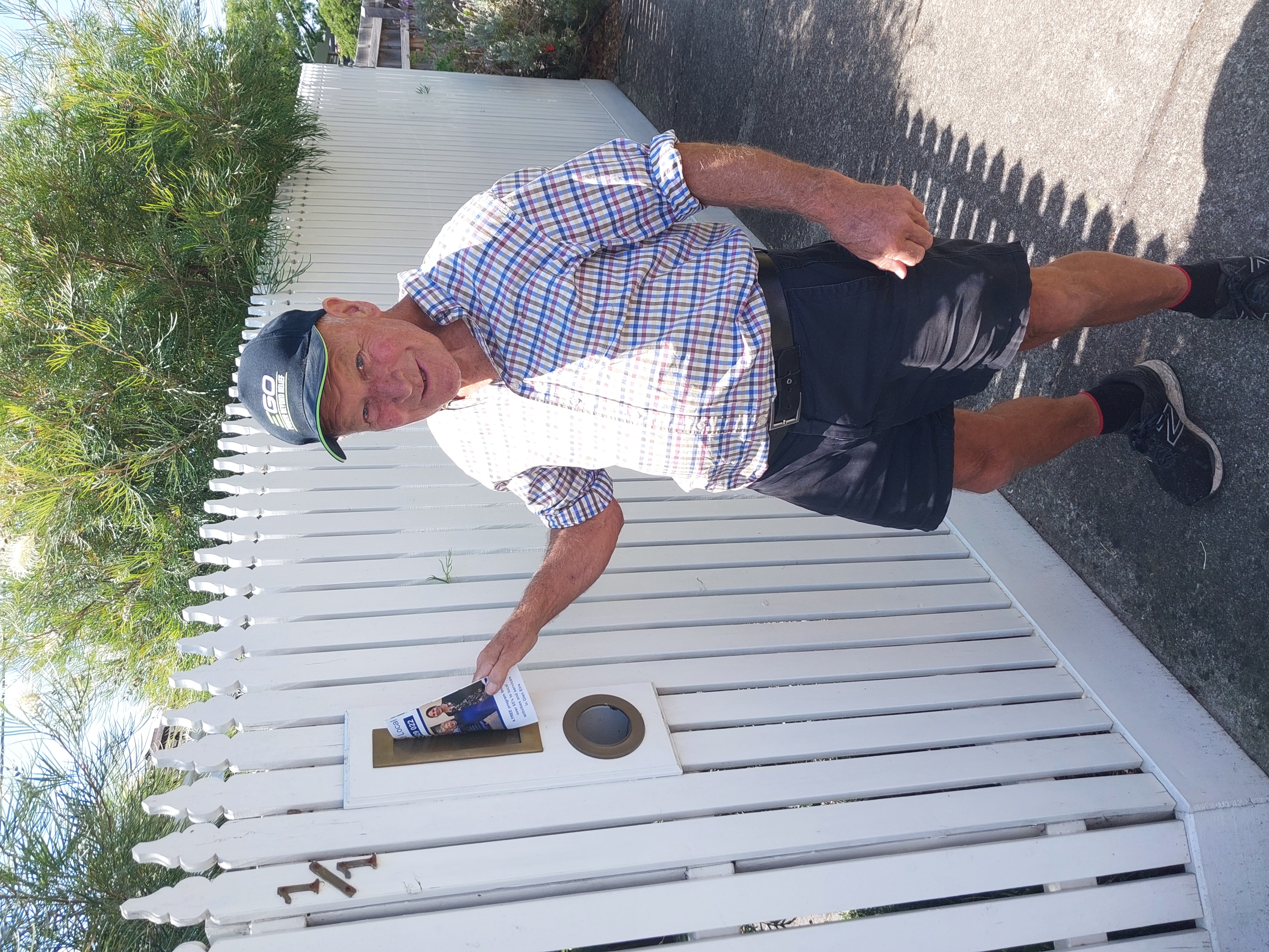 Ken, letter box dropping Connect Local brochures